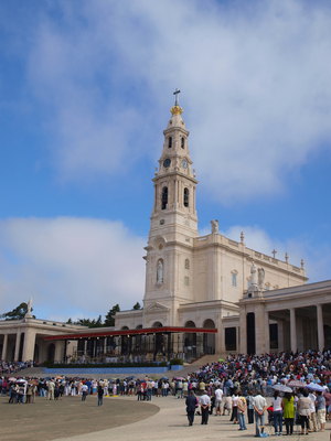 Basilica of Our Lady of the Rosary of Fatima in Portugal and over her big blue sky